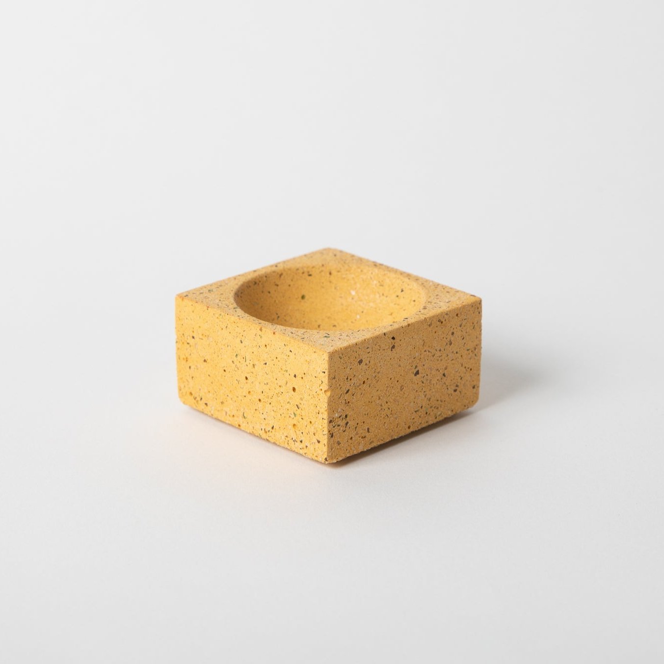 Square concrete terrazzo incense holder in marigold.