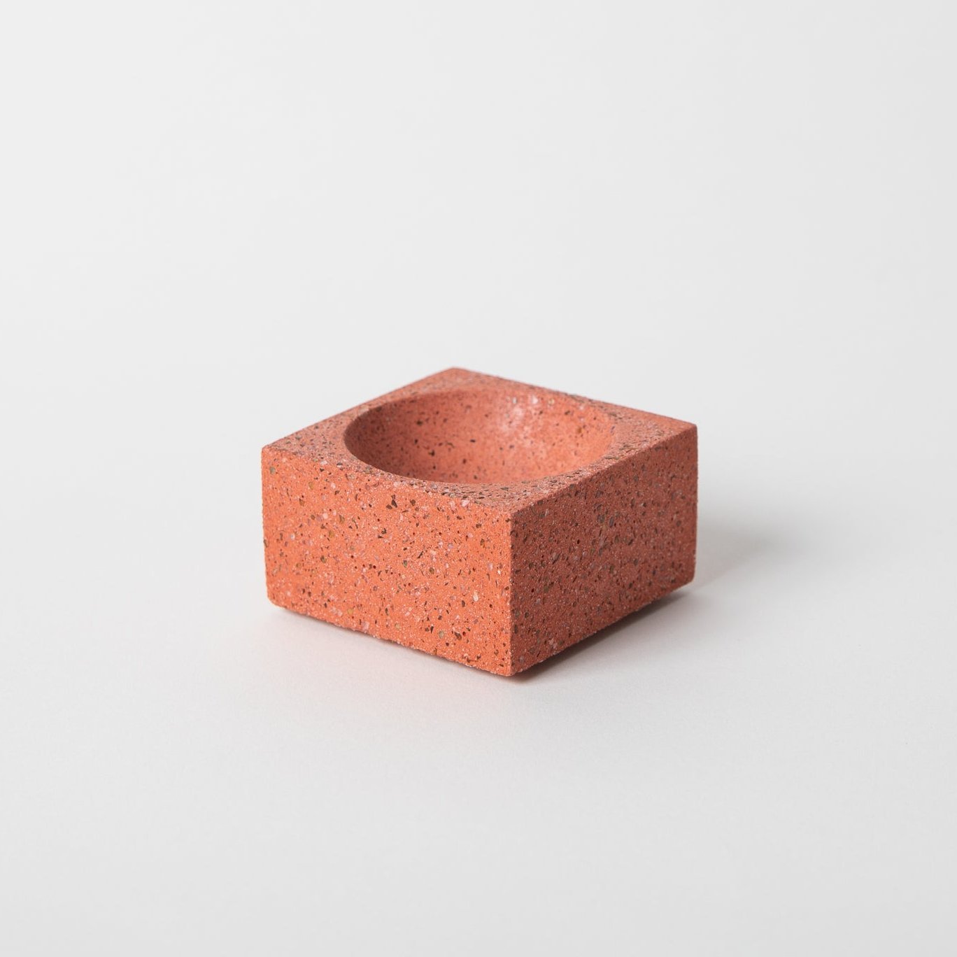 Square concrete terrazzo incense holder in coral.